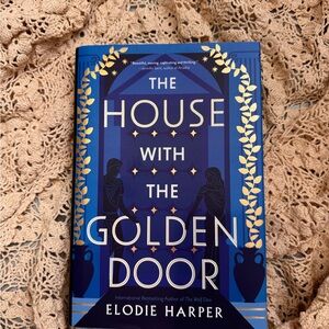 The House with the Golden Door Hardcover Book